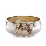 An American hammered silver and mixed metals bowl by Gorham & Co.