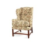 A George III mahogany wing armchair