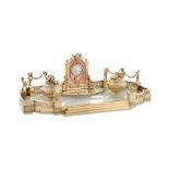 A very fine French silver-gilt and rose pink enamel desk set by Desire Jouannet