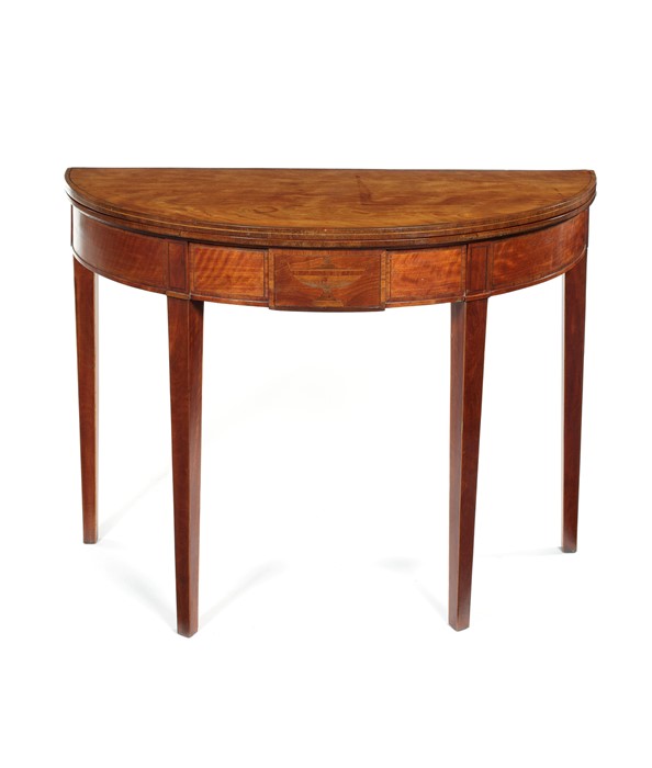 A George III satinwood and tulipwood crossbanded and sycamore demi-lune tea table