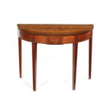 A George III satinwood and tulipwood crossbanded and sycamore demi-lune tea table