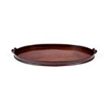 A George III mahogany oval tray attributed to Gillows