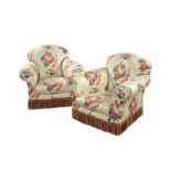 A pair of late Victorian Howard style easy armchairs