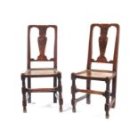A pair of George I elm side chairs