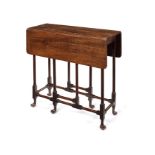 A George II mahogany drop-flap spider-leg table