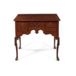 A George II Irish mahogany lowboy