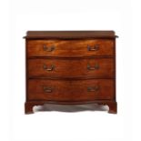 A George III mahogany serpentine chest attributed to Thomas Chippendale