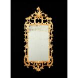A George III carved giltwood mirror, dated to the reverse May 1761