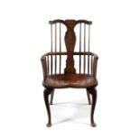 A George III ash comb-back Windsor armchair, probably West Country