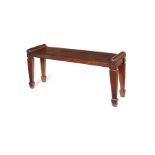 A Regency carved mahogany hall bench