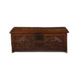 A Henry VIII carved oak boarded chest