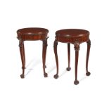 A pair of early 20t c. Chippendale style carved mahogany occasional tables by Waring & Gillow