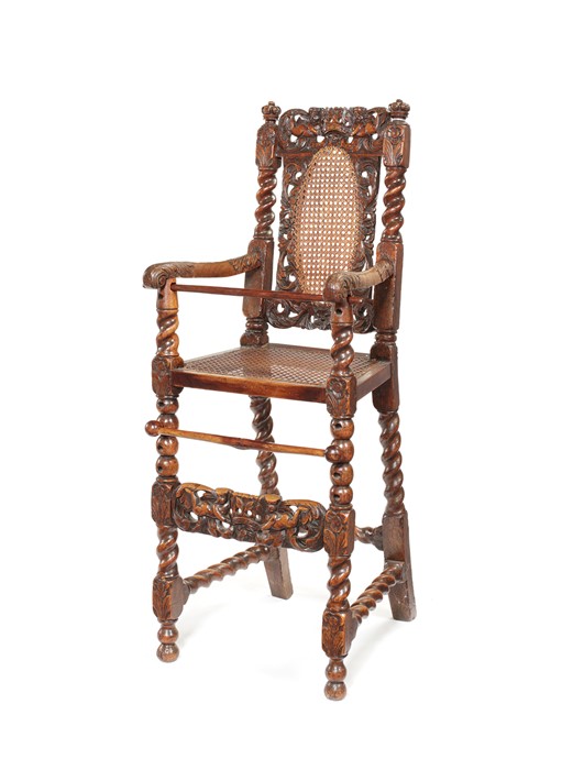 A rare William and Mary carved walnut child's high chair