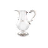 A George III Irish silver beer jug, maker’s mark indistinct, Dublin, 1774