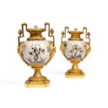A pair of late 19th century Louis XVI style gilt bronze mounted Japanese covered vases