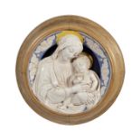 A large polychrome composite roundel depicting the Madonna and Child 20th c.