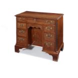 A George III mahogany kneehole desk