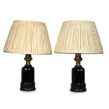 A pair of French black and gilt glass table lamps