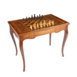 A Louis XV provincial walnut tric-trac table