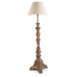 A late 19th century Italian Renaissance style carved giltwood standard lamp