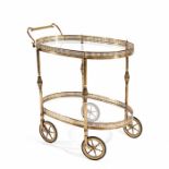 A 1950's brass two-tier drinks trolley in the manner of Jansen