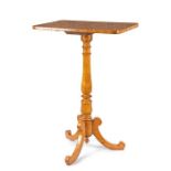 A Victorian maple tripod table
