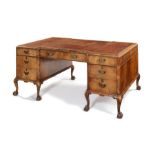 A 1920’s Georgian style walnut desk