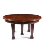 Victorian mahogany Jupe type circular extending dining table with two sets of leaves