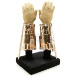 Lot #481 - MASTERS OF THE UNIVERSE (1987) - Skeletor's (Frank Langella) Light-Up Goldtone Gauntlets