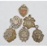 A group of six silver Victorian pocket watch fobs, 3.89toz.