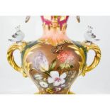 A fine 19th century German porcelain vase, the body painted to depict a mother and child with grapes