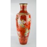 A Chinese early 20th century vase, with red ground, depicting peonies, 64cm high. A/F