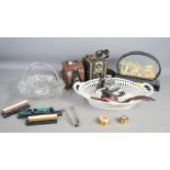 A miscellaneous group of items to include cameras, watches, and a pair of silver sugar nips.