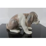 A Lladro model ceramic Beagle, 8cm high. [Entire proceeds from this lot are being donated to