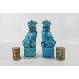 Two turquoise glazed Chinese dogs of fo, with two cloisonne trinket boxes.