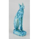 An Egyptian turquoise glazed cat, 14cm high.