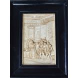 A framed plaster panel depicting Elizabeth I and others.