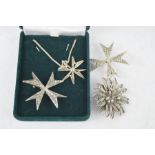 A group of silver jewellery including filigree brooch, star form filigree necklace pendant, and a