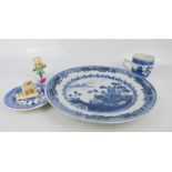 A group of blue and white 19th century ceramics, a Royal Doulton Chinese boy, and small carving.
