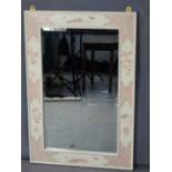 A wooden framed mirror, hand painted with decoration, 94 by 63cm.