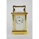 A brass carriage clock by Charles Bright of Peterborough.