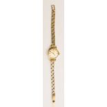 A 9ct gold Omega ladies wristwatch. 14.6g