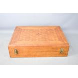 A parquetry backgammon box, including backgammon set.