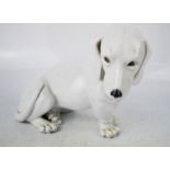 A German porcelain dachshund by Metzler & Orltoff Ilmehau no 1444.