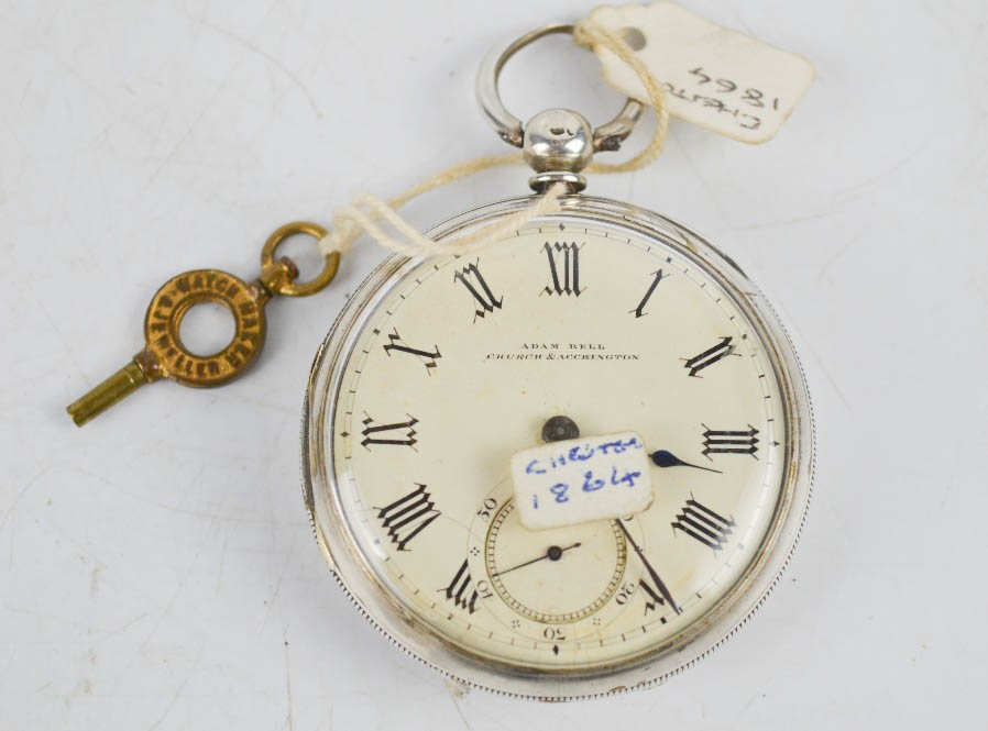 A silver 19th century pocket watch, Chester 1864, with cream enamel face, inset seconds dial, signed