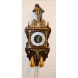 A 20th century mahogany bracket wall clock, with globe finial and weights, 61cm high.