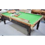 A E.J Riley pool / snooker table, together with pool ball set, snooker ball set, wall stand and