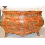 A 19th century French marquetry commode, with marble shaped top and gilt ormolu mounts and