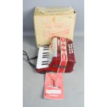 An Italian Bontempi childrens toy accordion.