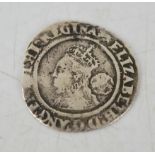 An Elizabethan silver coin, dated 1567.